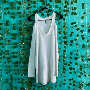 White shoulder showing sweater